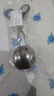 Metallic spherical ball or float valve appears to be packaged in plastic.