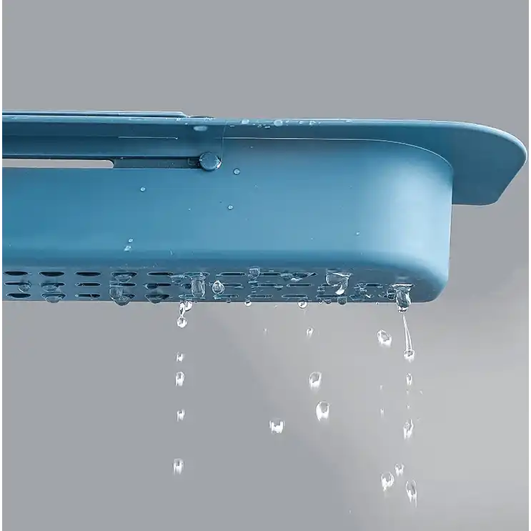 Teal plastic dish rack dripping with water droplets.