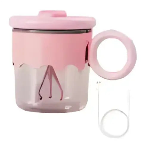 Pink ceramic mug with sailboat design and lid, ideal for kitchen use with TurboMix Magic Mug